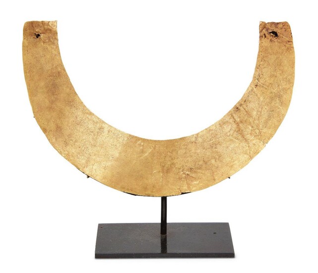 A gold torque necklace in the ancient style, mounted on stand, 17.5cm. diam., 24 grams Provenance: Private Collection Oliver Hoare (1945-2018); David Aaron Ancient Art May 1999