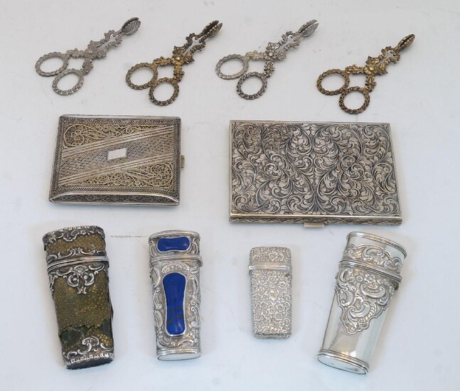 A group of silver and white metal, comprising: a silver etui, hallmarked London, date marks rubbed, engraved Simpson 36? Strand to underside, containing tortoiseshell knives and tools, 6.4cm high; a Continental cigarette case, stamped 800, the...