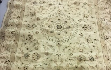 A large, machine-woven rug, manufactured in USA. Length 294cm,...