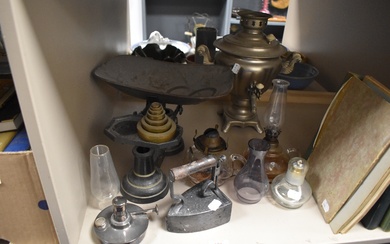 A mixed lot of vintage brass weighing scales, samovar, flat iron and various oil lamp parts.
