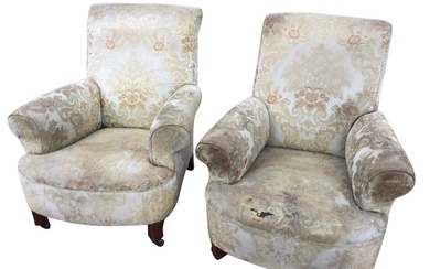 A pair of 1950s upholstered armchairs with high backs and...