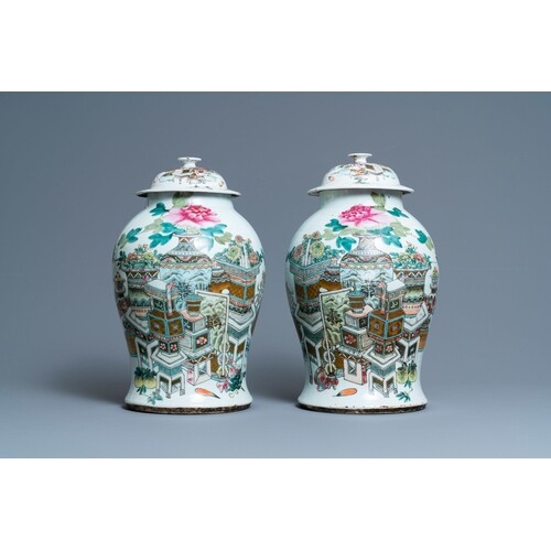 A pair of Chinese qianjiang cai vases and covers with antiqu...