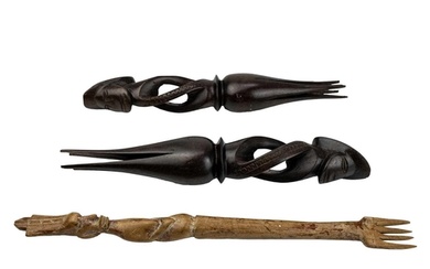 A pair of Fijian cannibal forks. Carved in hardwood, length ...