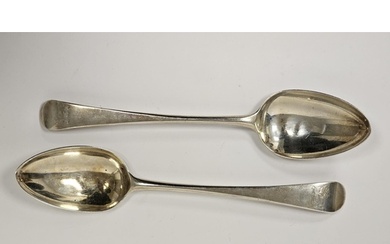 A pair of George III silver tablespoons, engraved with famil...