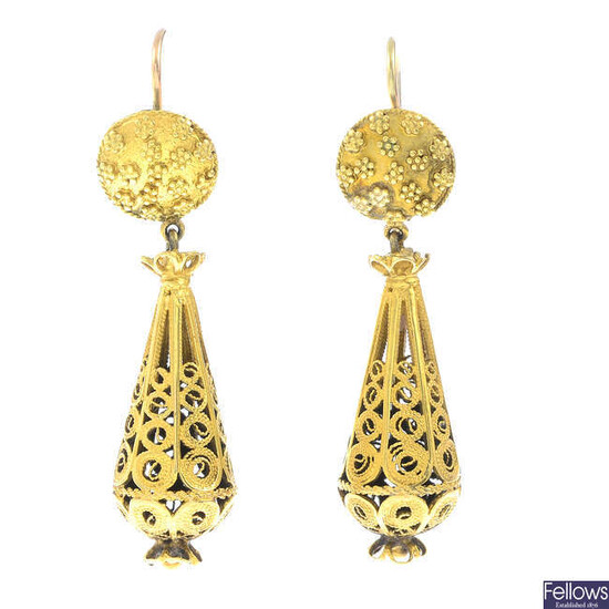 A pair of drop earrings.