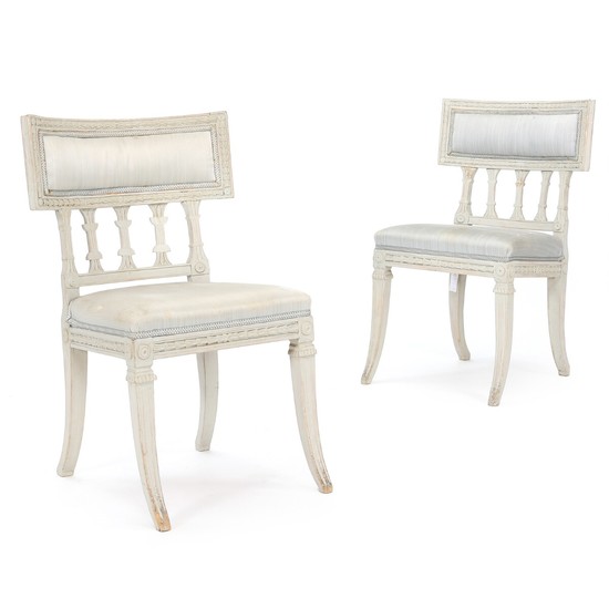 A pair of painted late Gustavian side chairs. Sweden, ca. 1810. (2).
