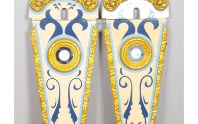 A pair of vintage fairground panels featuring gilt detail an...