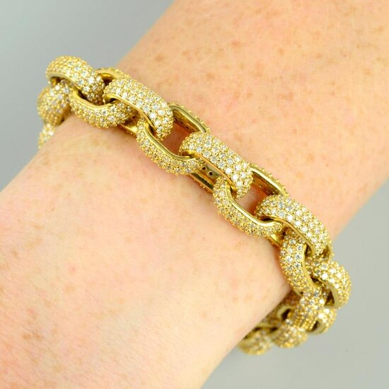 A pave-set diamond belcher-link chain bracelet.