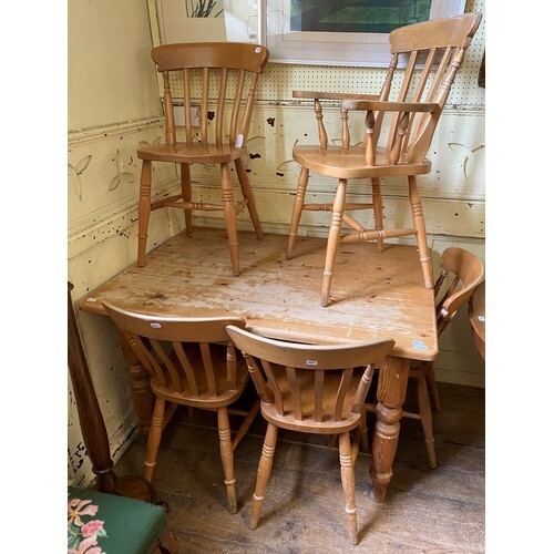 A pine kitchen table, 122 cm wide, and five matching chairs ...