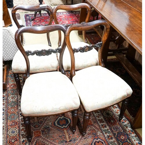 A set of four early Victorian rosewood dining chairs ...