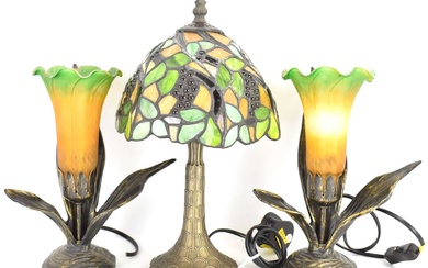 A small modern Tiffany-style table lamp with grape and leaf...