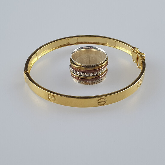 A sterling silver bracelet, with yellow gold plating and a ring in sterling silver.