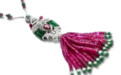A tourmaline and diamond necklace set with a pear-shaped pink tourmaline, tourmaline and emerald beads and brilliant-cut diamonds, mounted in 18k white gold.
