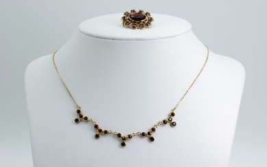 A two piece lot: Necklace and Brooch 8K Yellow Gold