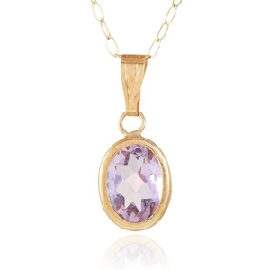 AN AMETHYST PENDANT in yellow gold, set with an oval