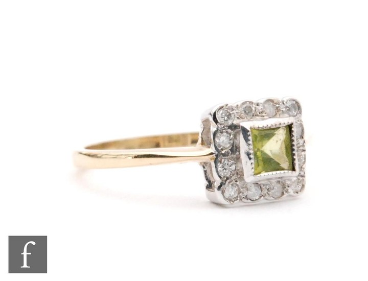 An 18ct peridot and diamond cluster ring, central square per...