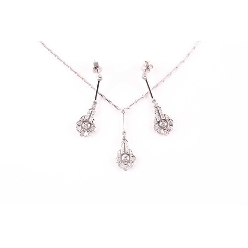 An 18ct white gold and diamond drop pendant necklace, set wi...