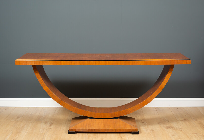 An art deco style walnut side table