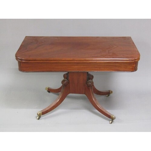 An early 19c mahogany fold over breakfast table, the table t...