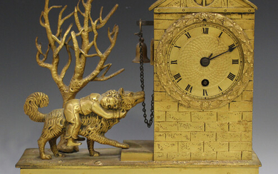 An early 19th century French ormolu mantel timepiece, the drum cased movement with silk suspension