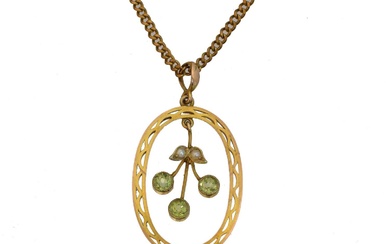An early 20th century peridot and split pearl pendant.