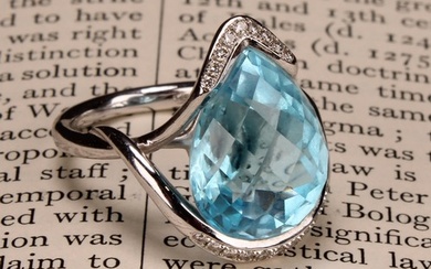 An impressive topaz and 18ct white gold ring, the large sky ...