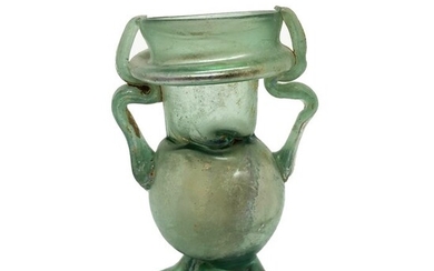 Ancient Roman Glass dropper juglet with the shape of a pomegranate,9 cm. Exhibited at Ifergan Museum