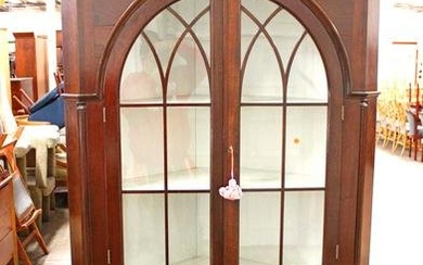 Antique 2pc solid mahogany Federal style corner cabinet with arched doors and key, has age crack