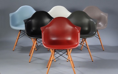 Charles Eames. A set of six armchairs, model DAW, multicolored polypropylene. (6)