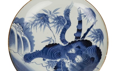 Blue and white porcelain charger Chinese, 18th Century painted with...