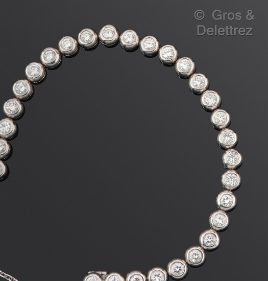 Bracelet « Tennis » en or gris ET PLATINE... - Lot 395 - Gros & Delettrez