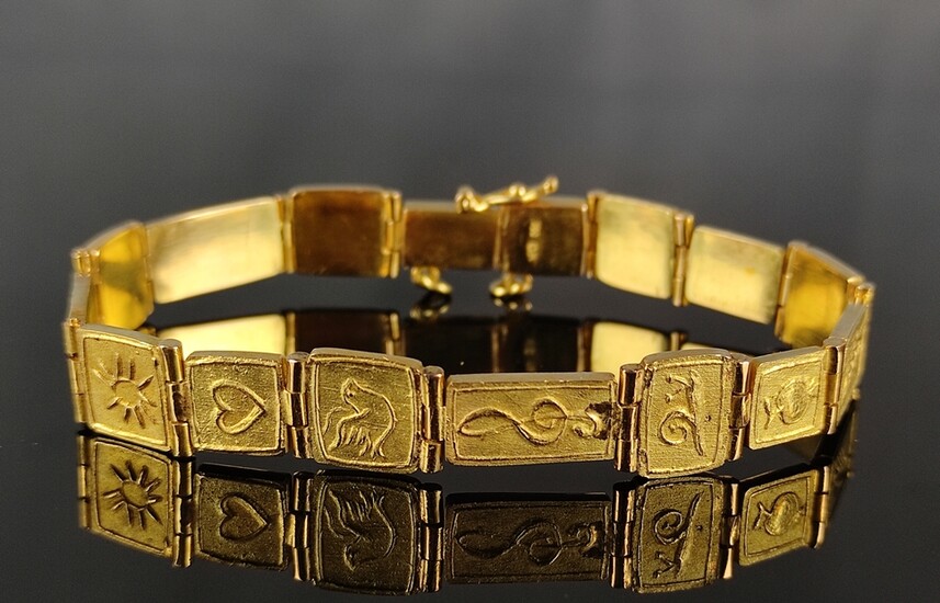 Bracelet, flexible links with various Christian symbols, 750/18K yellow gold, 41.7g, length 18cm
