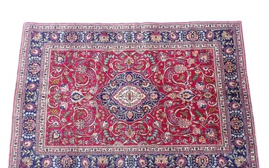 Carpet / Rug: A North West Persian Tabriz carpet the red gro...