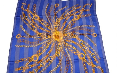 NOT SOLD. Celine: A dark blue silk chiffon scarf with golden chain motif. 132 x...