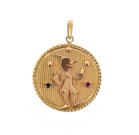Circular medal in 18 K (750 °/°°°) yellow gold decorated with a juggling clown on a striated background, set with a green and a pink stone, the border twisted; Gross