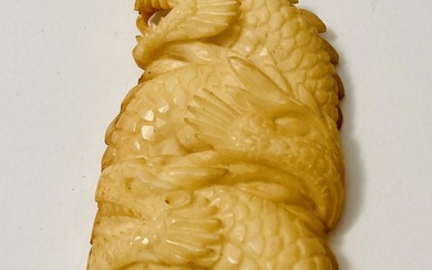 Dragon pendant bone carved