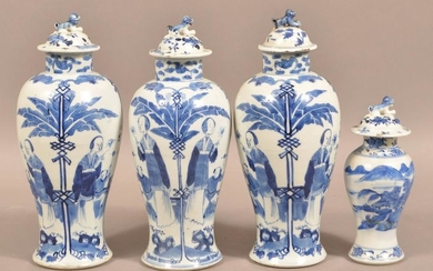 Four Blue and White Oriental Porcelain Covered Vases.