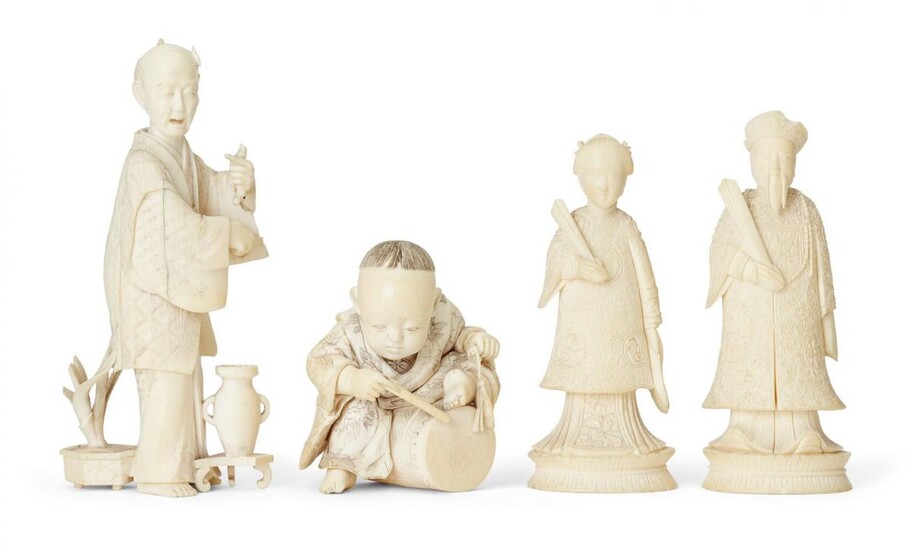 Four Japanese ivory okimono Meiji Period, to include a young boy playing a drum with polychrome detail, a Chinese couple holding fans, and an elderly man cutting flowers for Ikebana, 12cm high (4)