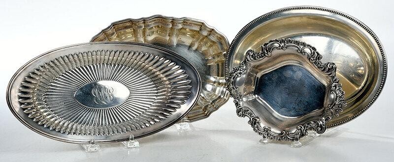 Four Oval Sterling Dishes