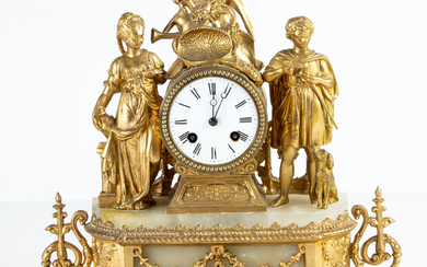 French gilt metal figural and onyx figural mantel clock