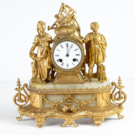 French gilt metal figural and onyx figural mantel clock