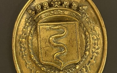 Grand motif d’ornement aux armes de Colbert (1619-1683). Ovale en bronze. 26 x 19 cm....