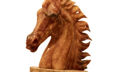 Horse head on a pedestal.