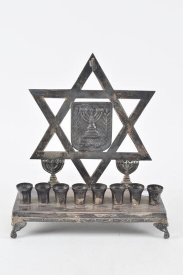 Jewish silver menorah candle holder. Early 20th