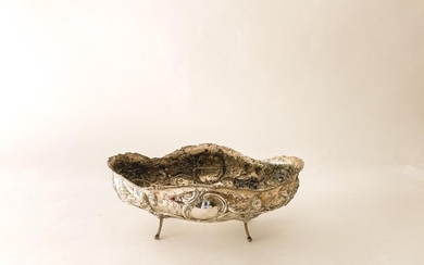 Large four-legged planter in the Rocaille style, 19th century, chased silver, traces of stamps, w. 52,5 cm [wear and tear and slight alterations].