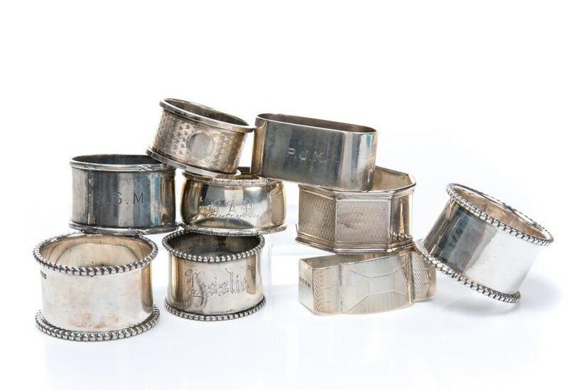NINE ASSORTED SILVER NAPKIN RINGS 291g