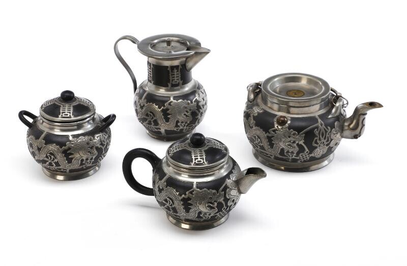 NOT SOLD. An early 20th c. Tung King Shun yixing-ware and pewter tea-set. (4) – Bruun Rasmussen Auctioneers of Fine Art