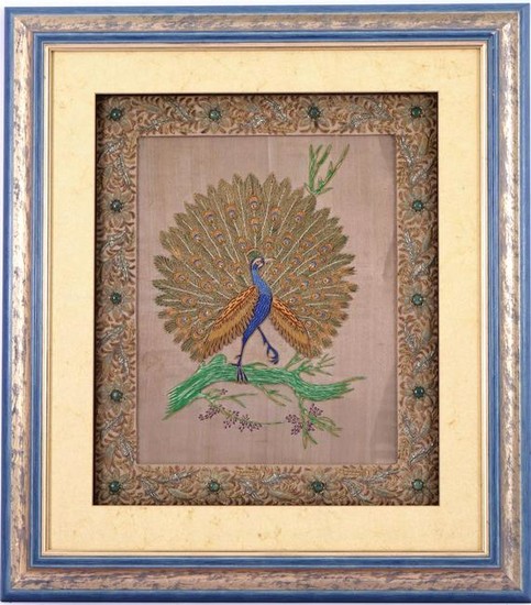 Oriental wall decoration in a peacock frame, made of
