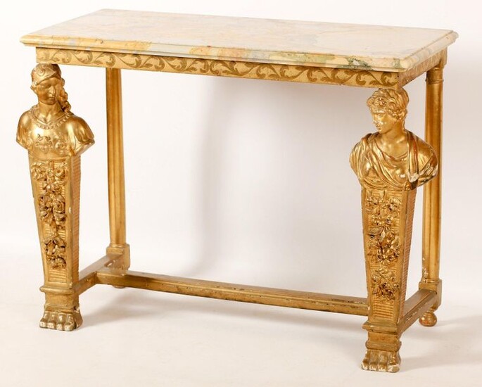 PIETEMENT DE CABINET formant table console, en bois sculpté et doré aux pieds de façade en forme de personnages engainés ; dessus en marbre brèche jaune (postérieur).