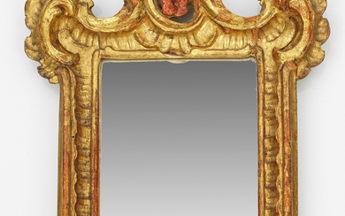 Petit miroir baroque Bois sculpté, serti et doré. Cadre de miroir étroit, rectangulaire, composé de...